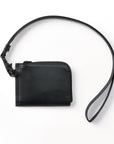 Round wallet with shoulder strap